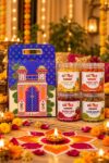 HealthyGrabz Diwali gift bag - blue printed festive carry bag with 4 chips jars, rangoli and diyas