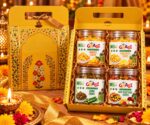 HealthyGrabz Diwali yellow gift bag with 4 jars of chips - mango, pineapple, okra and mix vegetable (illustration)